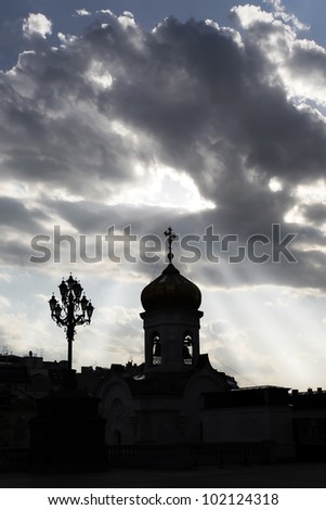 Silhouette of Christian church with a cross