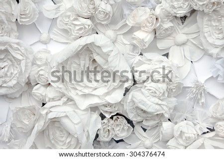 decorative background from white paper flowers of paper-mache