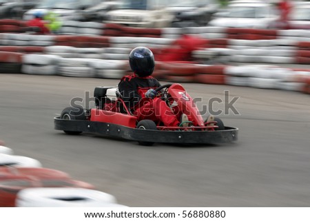 Go cart racer struggling on circuit