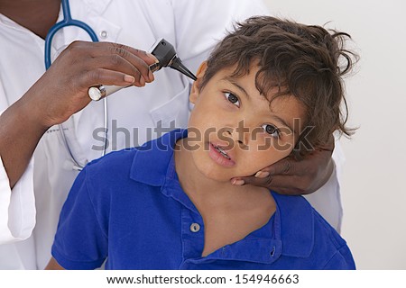 medical visit - young boy- examination of the ears