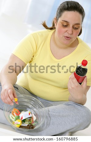 daily life of an overweight woman - Woman eating fast food and sweets