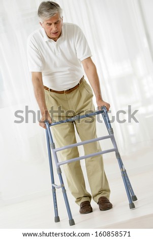 Senior Man With Walking Frame after accident