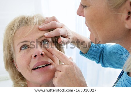 Senior Medical Check Up With Focus On Eyes Examination