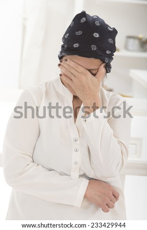 Portrait of a very sad and depressed Asian Thai older woman