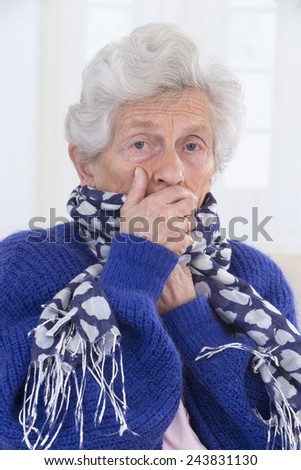 Sick woman coughing with sore throat