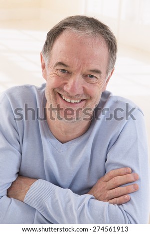Caucasian man mature handsome portrait blue eyes smiling portrait