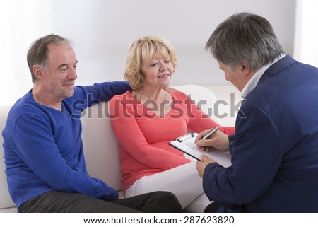 Senior couple discussing financial plan with consultant