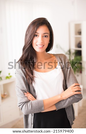 cheerful young businesswoman real estate agent visiting new house for sale or rent