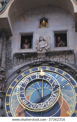 Clock on tower of the town hall  with effigy of a the college of apostles details