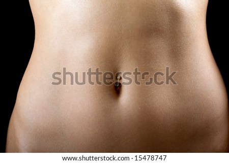 stock photo a sexy tummy of the young woman Isolated on black