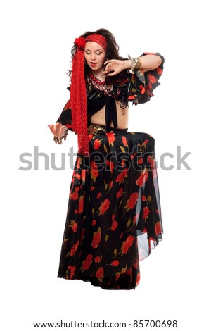 stock photo : Sensual gypsy woman in a black skirt. Isolated