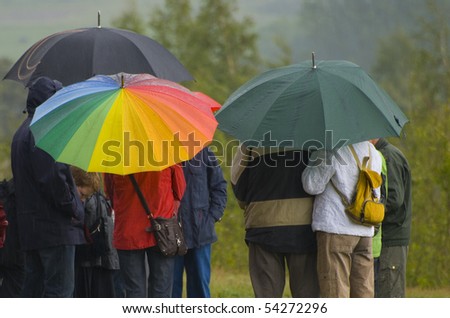 people with umbrellas
