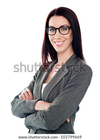 Successful corporate lady posing with folded arms isolated over white