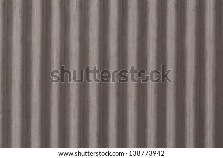 Corrugated asbestos cement roof sheet.