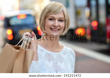 Pretty attractive lady with shopping bags