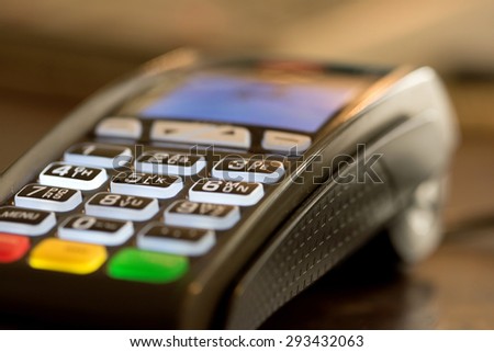 Close up image of credit card swipe machine