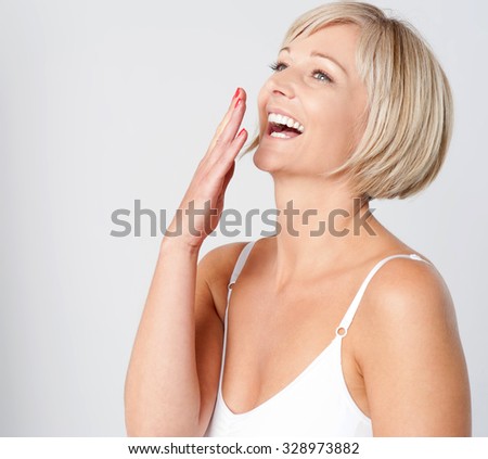 Pretty caucasian lady laughing out loud