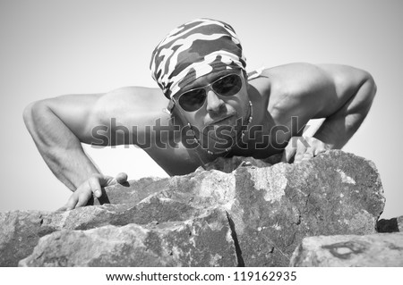 Portet muscular man with a beautiful body. black-and-white photo