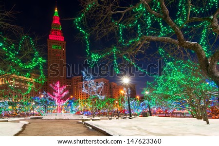 CLEVELAND, OH - DECEMBER 30: The Terminal Tower and Public Square in Cleveland Ohio are colorfully lit up for the Christmas season on December 30, 2012. The lighting is an annual attraction.