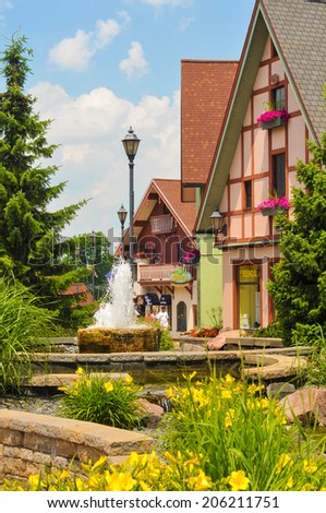 FRANKENMUTH, MI - JUNE 28, 2014: German-style architecture forms the backdrop of River Place, a new collection of shops and attractions in this tourist haven, settled in 1845 by Lutheran immigrants.