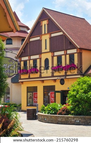 FRANKENMUTH, MI - JUNE 28, 2014: German-style architecture forms the backdrop of River Place, a new collection of shops and attractions in this Michigan town known best for Christmas and German food.