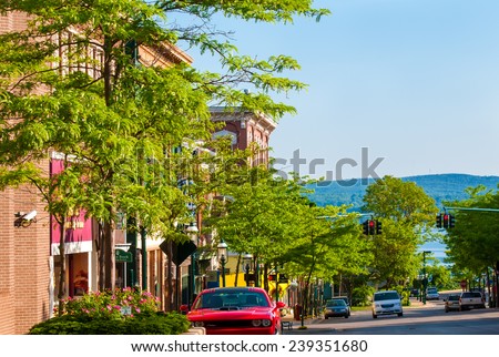 PETOSKEY, MI - JUNE 27, 2014: The view to the north down Howard St affords a glimpse of Little Traverse Bay off Lake Michigan, a setting that makes this quaint town a popular coastal resort.