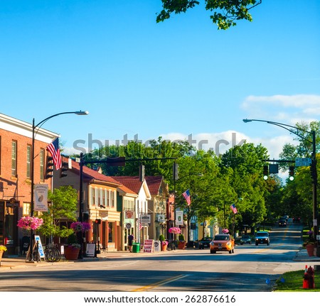 HUDSON, OH - JUNE 14, 2014: Main Street in Hudson is lined with quaint shops and businesses that go back more than a century, giving the NE Ohio village a unique charm.