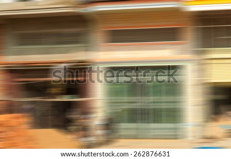 Masonry work in Phnom Penh serving as an intentionally blurred background