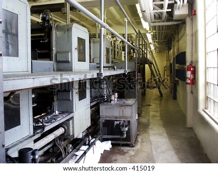 Rear view of web press (printing press) at publishing company