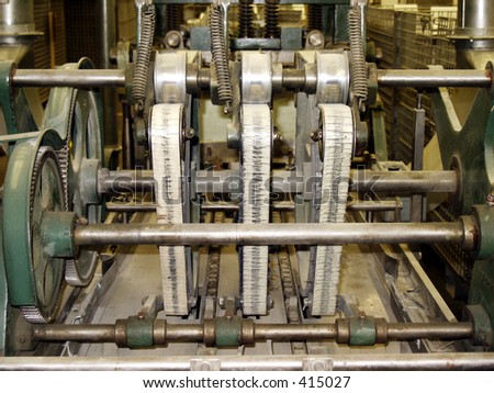 Belts on old (long idled) stitching machine in publishing house