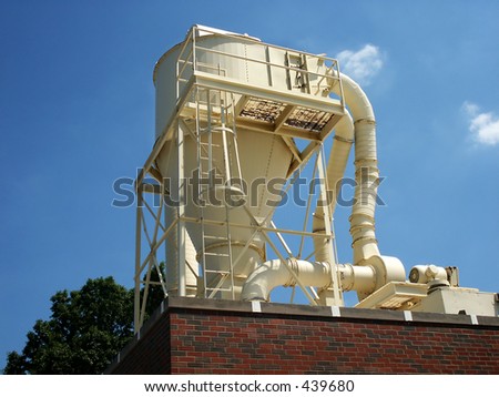 Paper baler on roof of publishing company