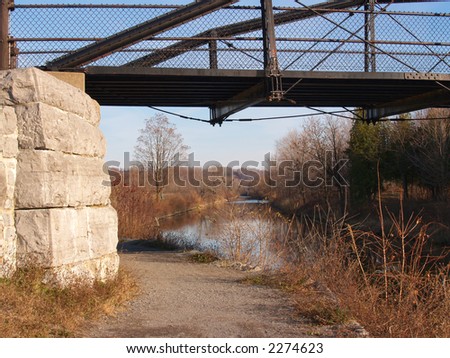 Footbridge over the old Erie Canal and towpath