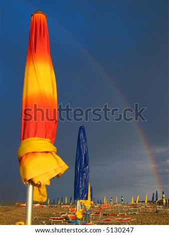 beach umbrellas after a storm during late summer