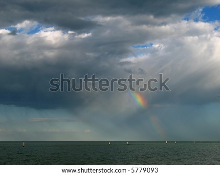 rainbow over the sea after a storm