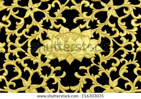 vintage decorated pattern with golden lotus, golden lotus decorated on black background