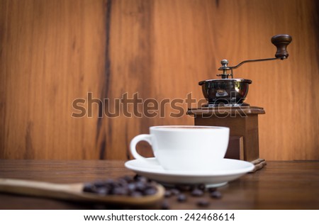 old coffee mill and coffee beans and coffee