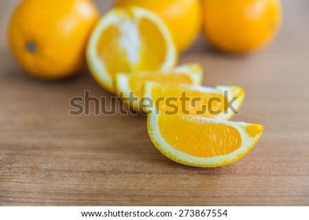Orange fruit half and three segments or cantles isolated on white background cutout