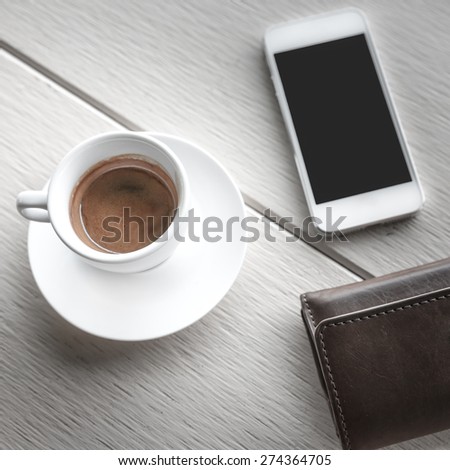 coffee cup on table and mobile phone,wallet-Vintage Style