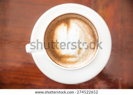 cup of coffee, cup of coffee on brown wooden table