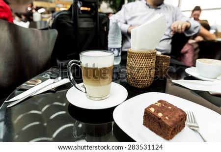 Cake chocolate brownies and coffee latte