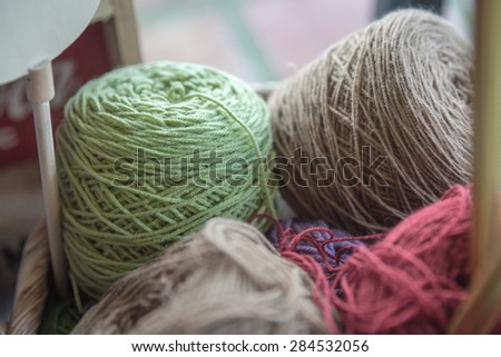 yarn in wicker basket, Colorful yarn in wicker basket
