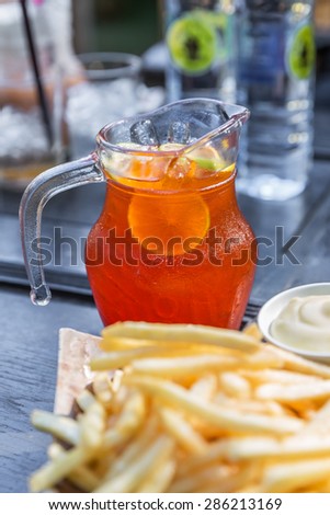 Iced tea in the pitcher. A jug of cold tea