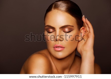 makeup face of beautiful young woman. Horizontal shot, studio.