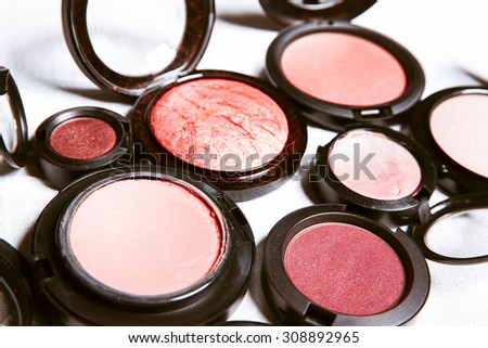 Makeup products on white background with copy space for your text. Studio shot. Horizontal picture.