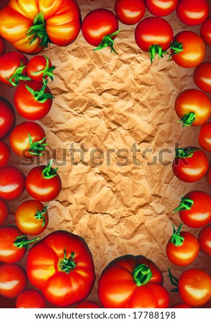 Clipping Path. tomatoes frame on brown recycling paper