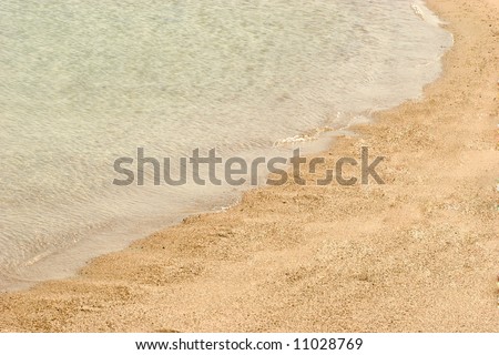 Water\'s edge, beach with golden sand