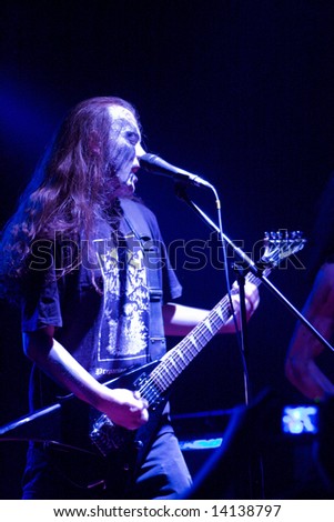 Black metal artist on stage singing, St. Petersburg, Russia 05.10.2007