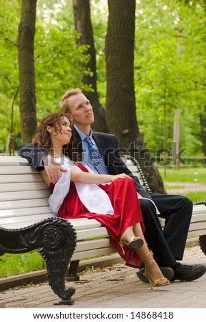 http://image.shutterstock.com/display_pic_with_logo/97483/97483,1215985724,2/stock-photo-happy-young-couple-sitting-on-bench-in-park-14868418.jpg