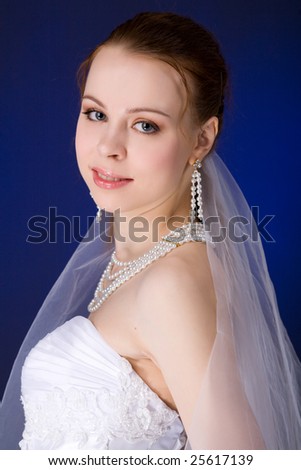 Bride with piercing look over dark 