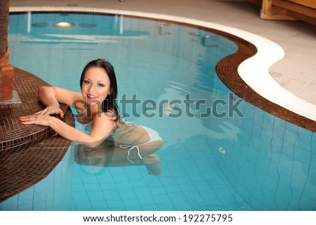 Sexy nudes beautiful caucasian woman in the jacuzzi. or pool Flirtatious look on the face.